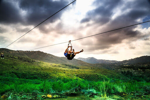 Flying High and Racing Friends: My Thrilling Day at Zip Zoom Ziplines